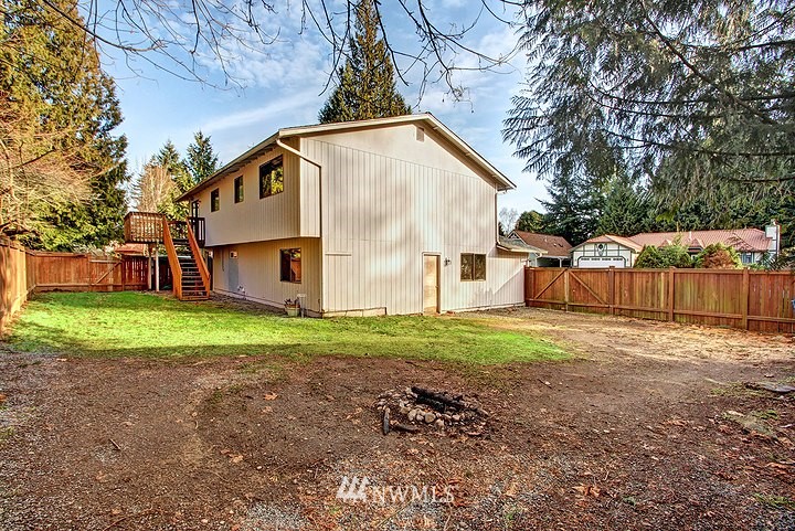 2905 165th Place Southeast Bothell, WA 98012 - Photo 18 of 18 a view of a house with backyard and a tree