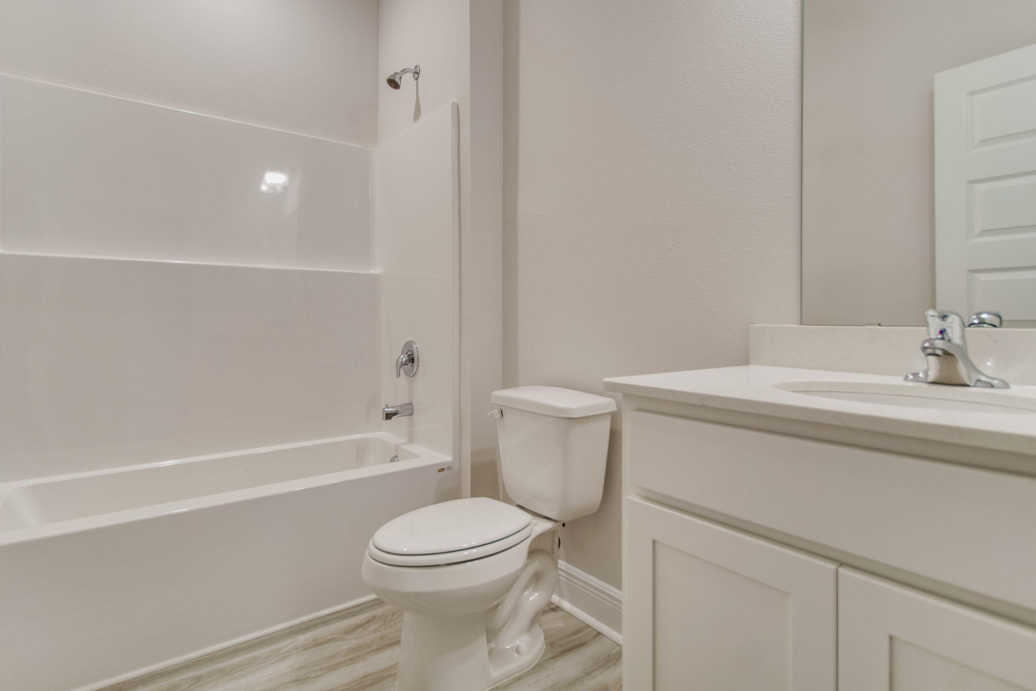 8676 Bluebell Street Milton, FL 32583 - Photo 31 of 32 a bathroom with a sink a toilet and shower