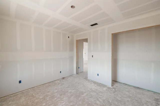 a picture of a bathroom with a shower and a mirror