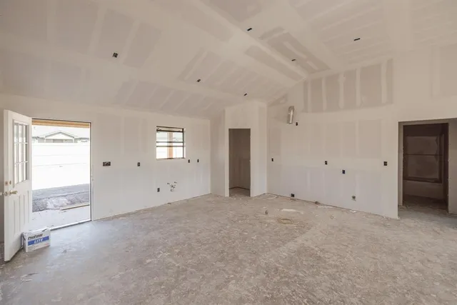 a view of an empty room with window