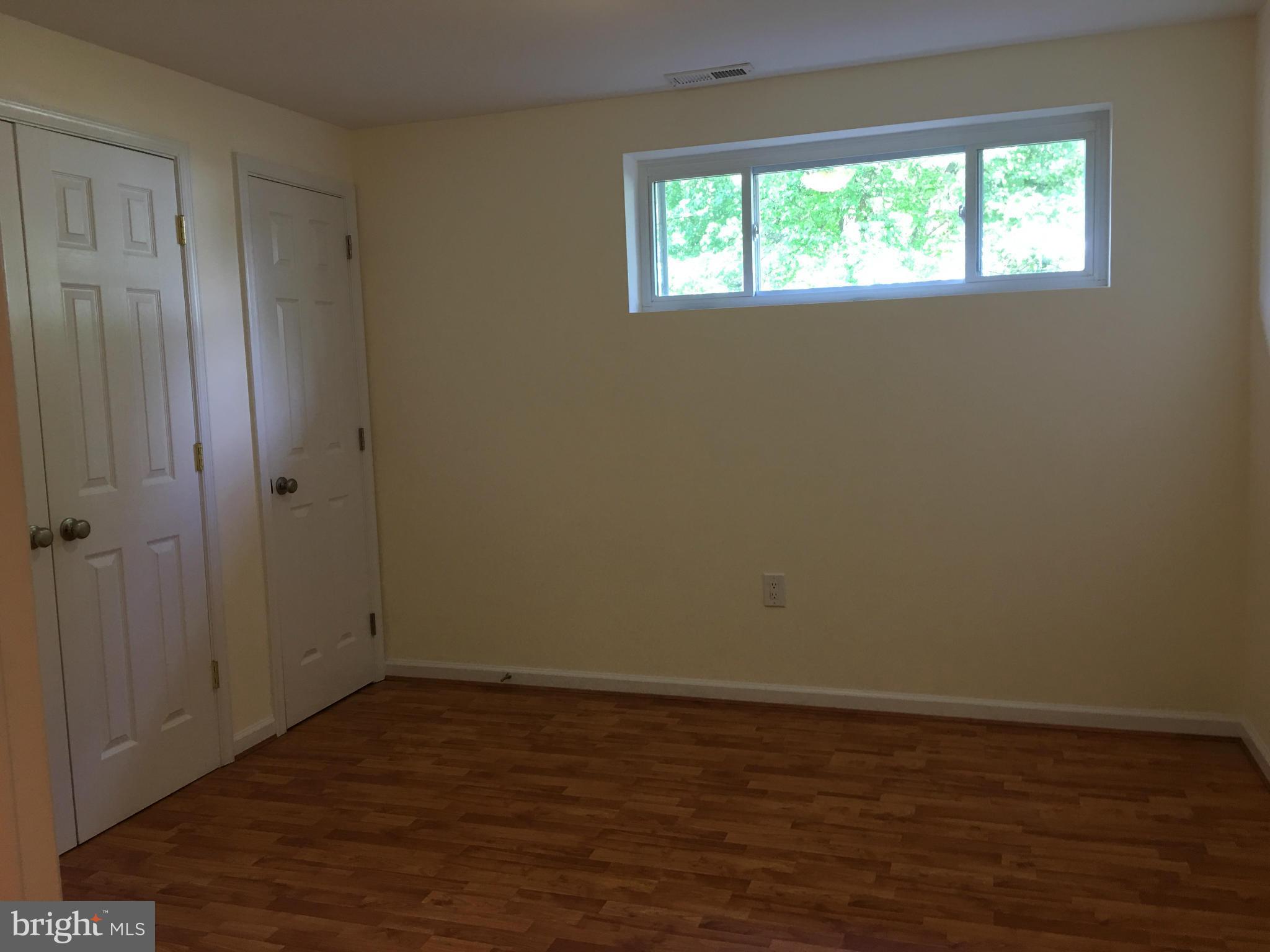 13306 Lydia Street Silver Spring, MD 20906 - Photo 23 of 30 an empty room with a window
