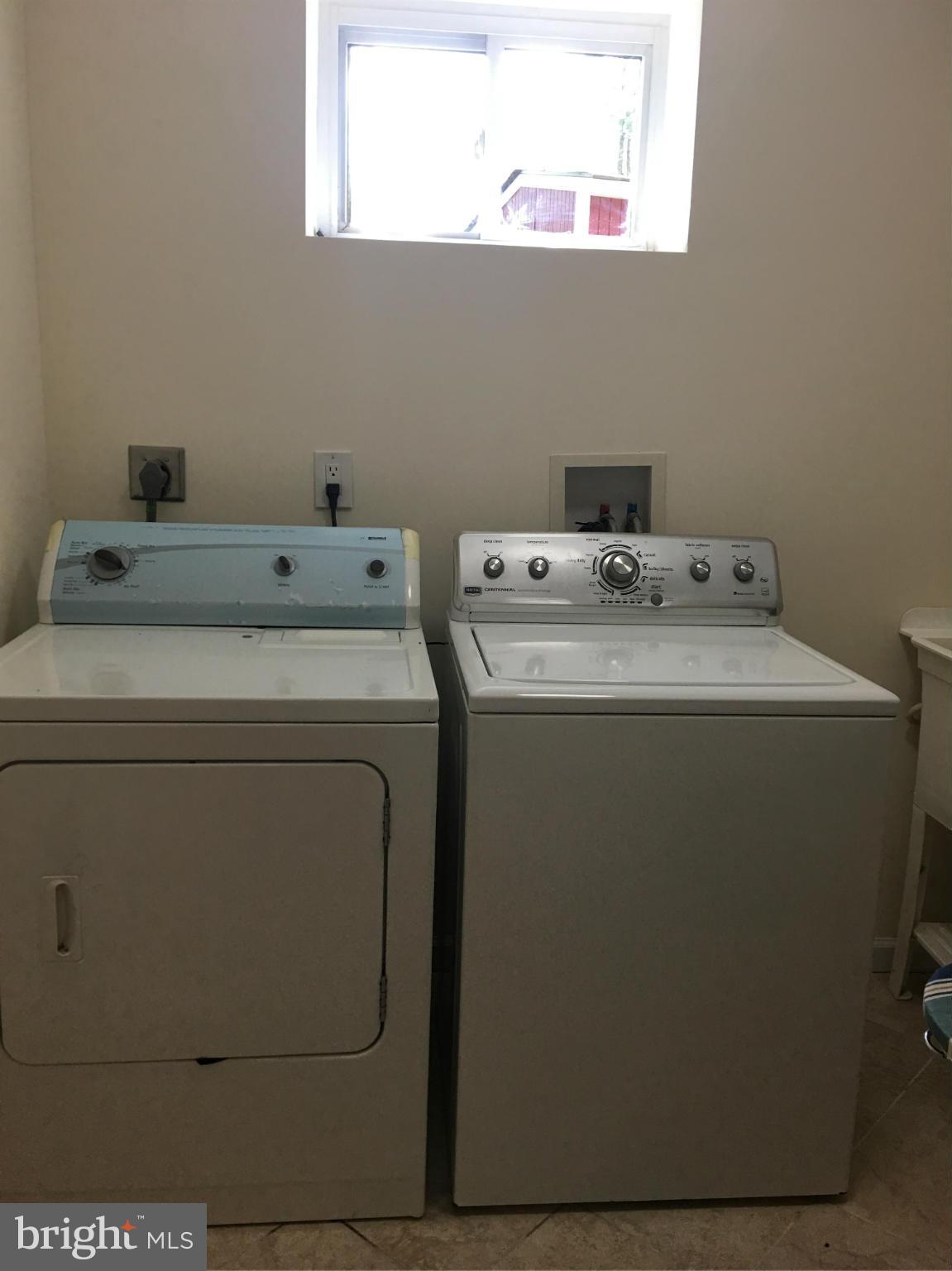 13306 Lydia Street Silver Spring, MD 20906 - Photo 29 of 30 a utility room with dryer and washer