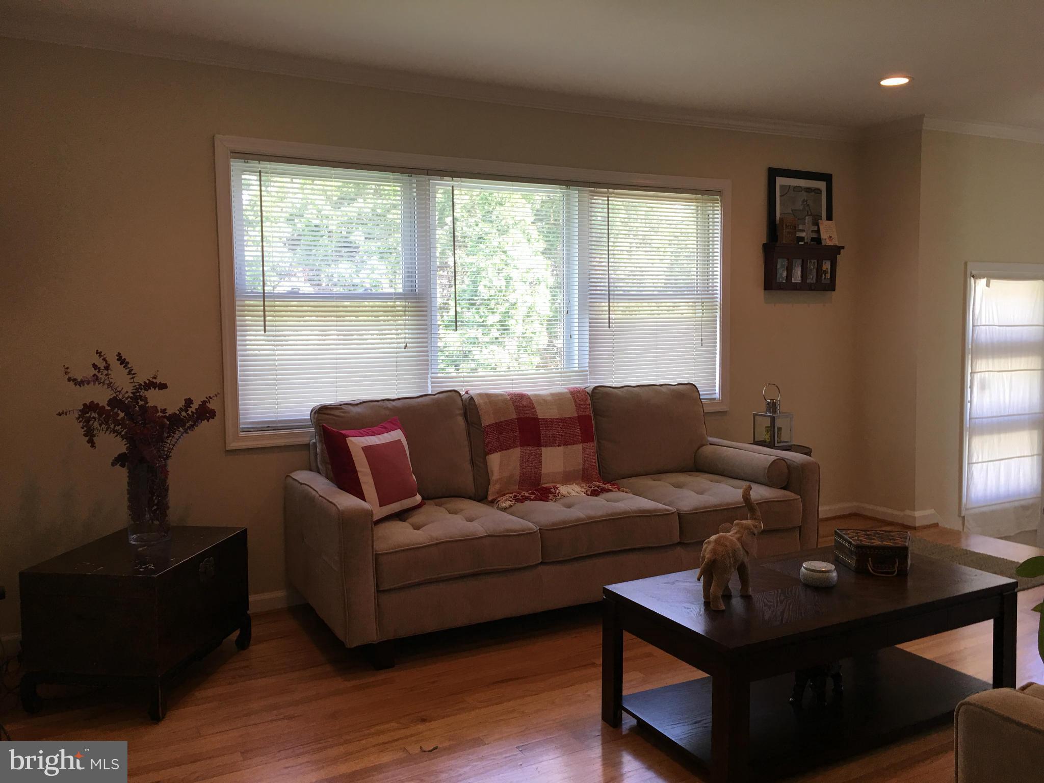 13306 Lydia Street Silver Spring, MD 20906 - Photo 4 of 30 a living room with furniture and a window
