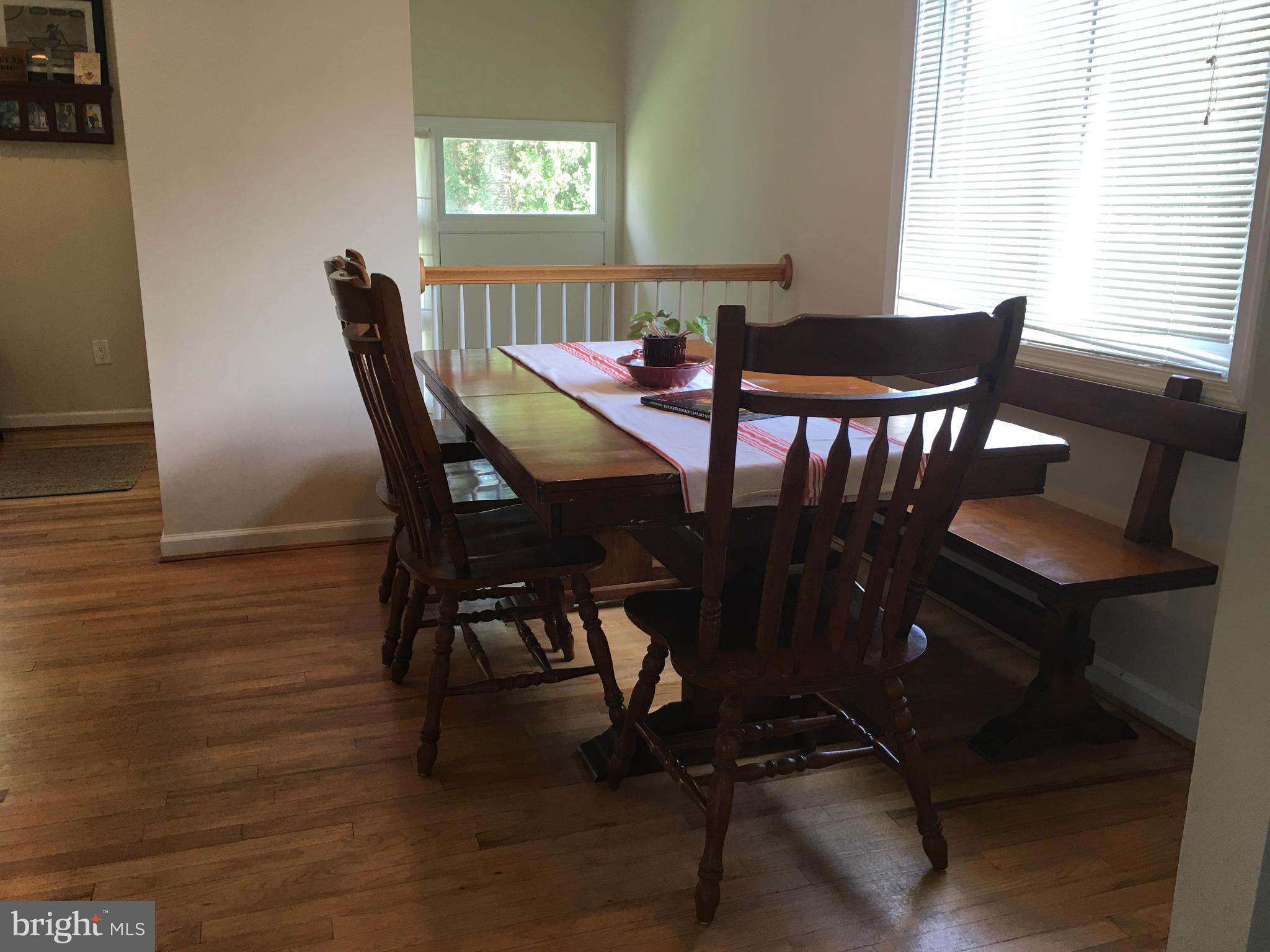 13306 Lydia Street Silver Spring, MD 20906 - Photo 5 of 30 a view of a dining room with furniture and window