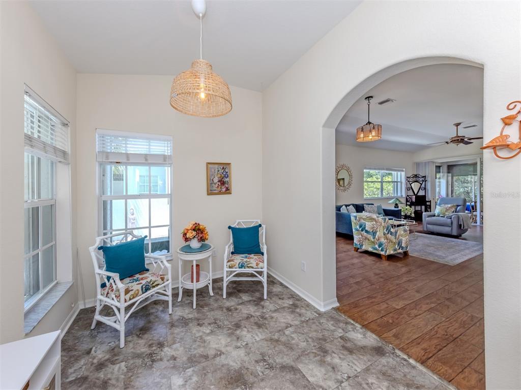 205 Reclinata Circle Venice, FL 34292 - Photo 23 of 62 a view of a livingroom with furniture and a window