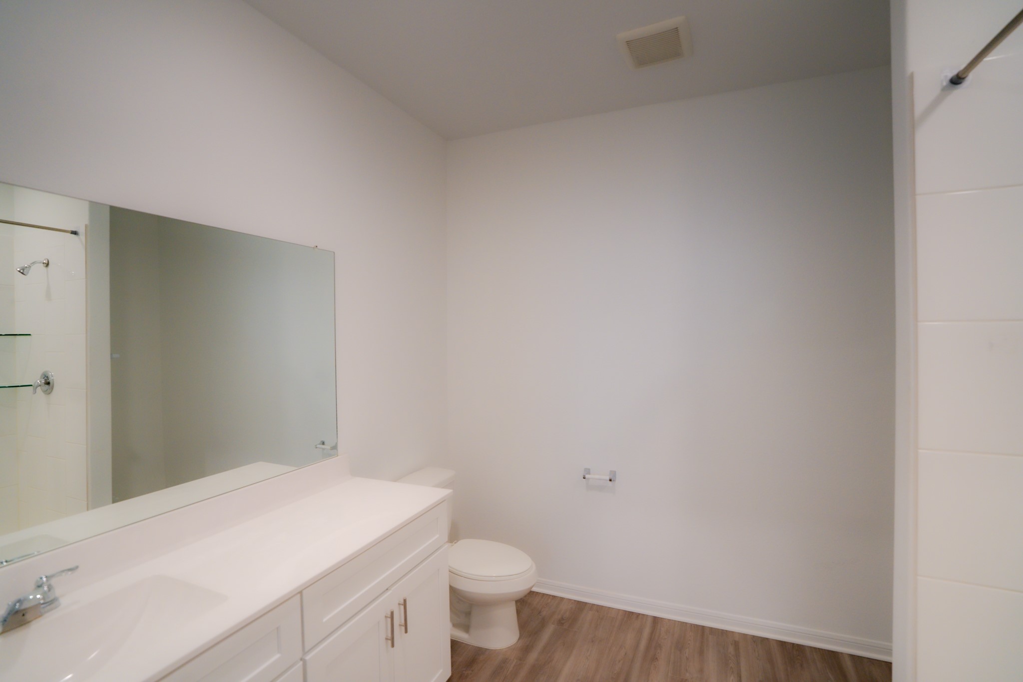 16126 Elbridge Court Conroe, TX 77302 - Photo 8 of 15 a bathroom with a sink and a toilet