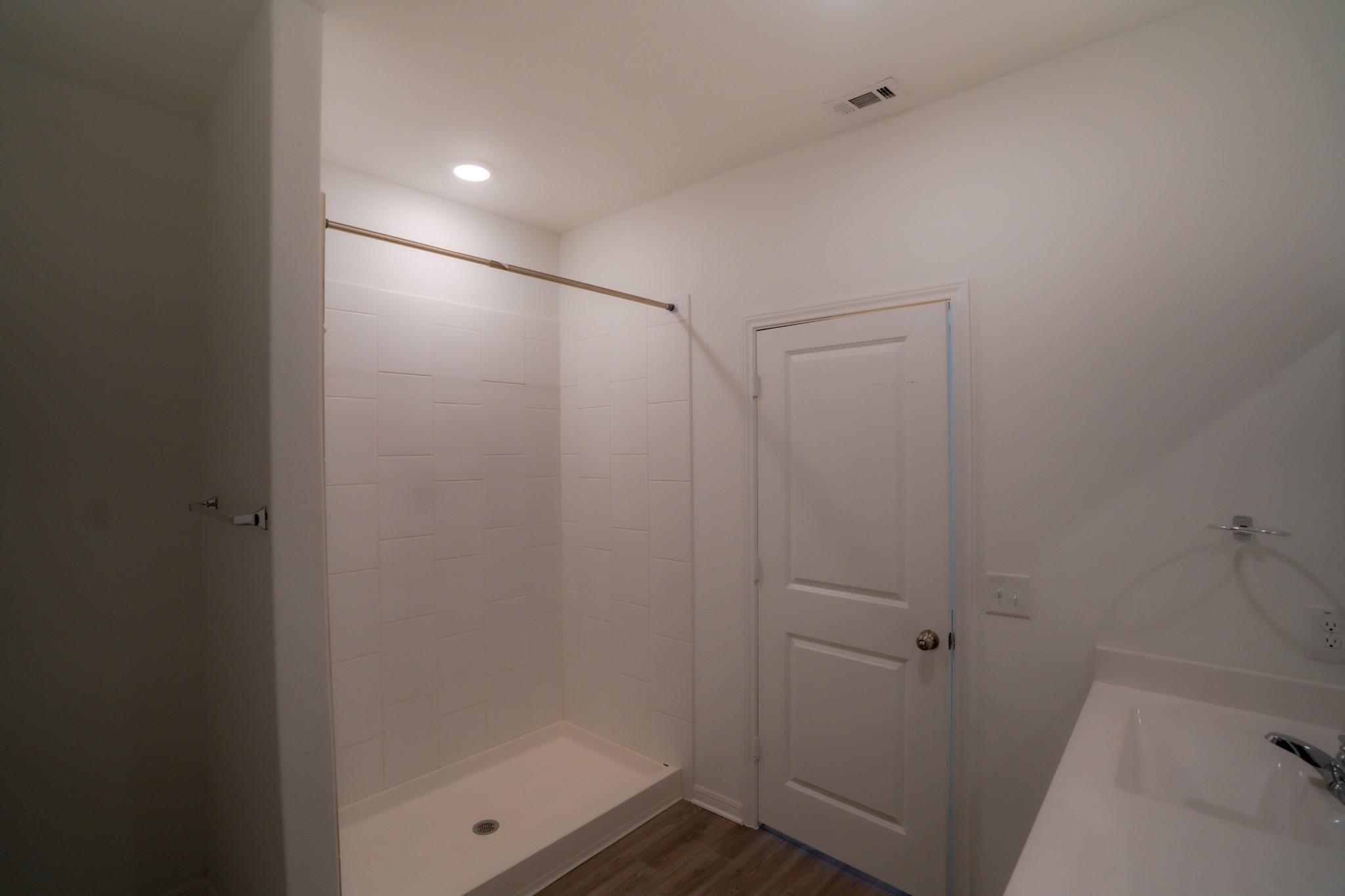 16126 Elbridge Court Conroe, TX 77302 - Photo 9 of 15 a bathroom with a shower