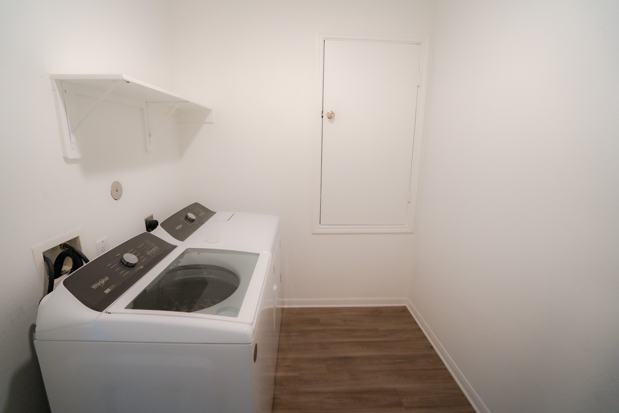 16126 Elbridge Court Conroe, TX 77302 - Photo 10 of 15 a utility room with dryer and washer