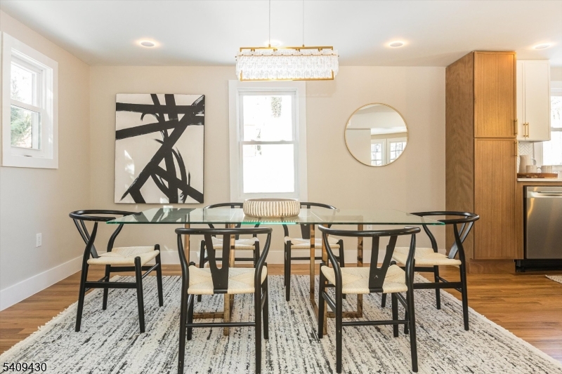 27 Oakridge Road West Orange, NJ 07052 - Photo 13 of 29 a view of a dining room with furniture and wooden floor