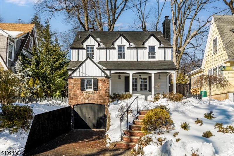 27 Oakridge Road West Orange, NJ 07052 - Photo 2 of 29 a front view of a house with a yard