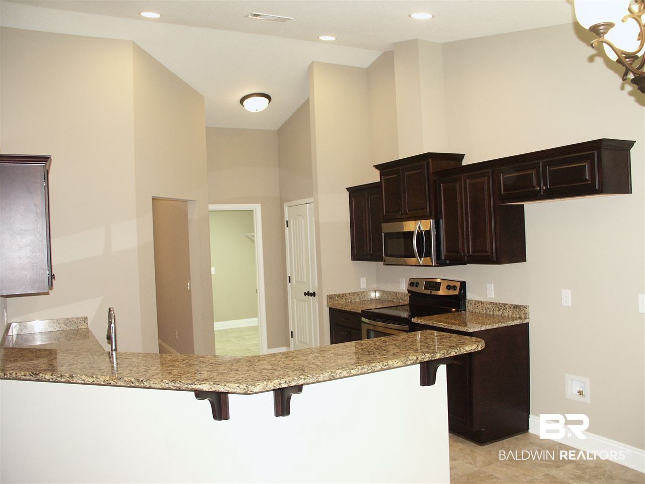 12967 Westfield Loop Lillian, AL 36549 - Photo 6 of 28 Kitchen with Granite Coun