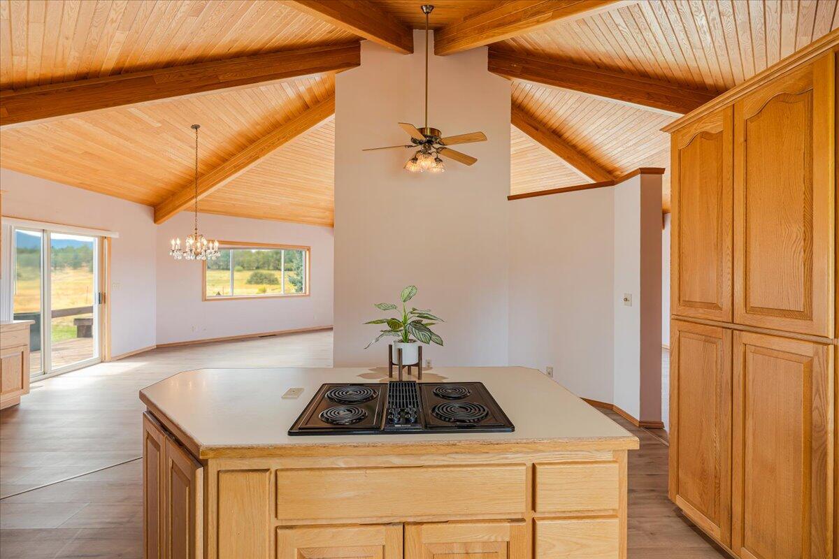 64515 Rock Springs Road Bend, OR 97703 - Photo 8 of 49 Kitchen island and back of Fireplace