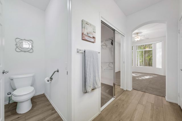 a bathroom with a toilet sink and a shower
