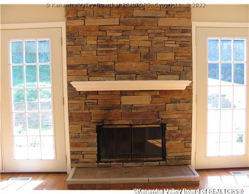 Den/Family/Great Room. Stacked Stone, Wood Burning Fireplace