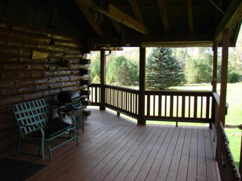 1388 South Solon Road Solon, ME 04979 - Photo 19 of 21 Patio/Deck. log home deck