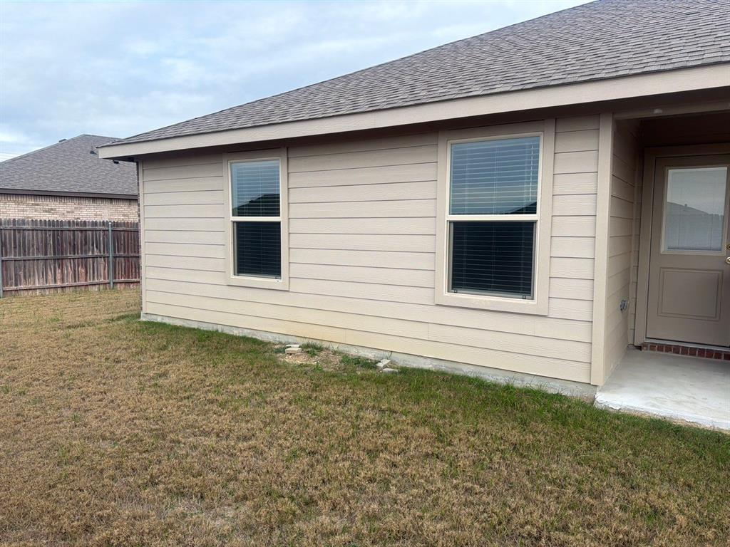 721 Durango Lane Cleburne, TX 76033 - Photo 22 of 25 a backyard of a house