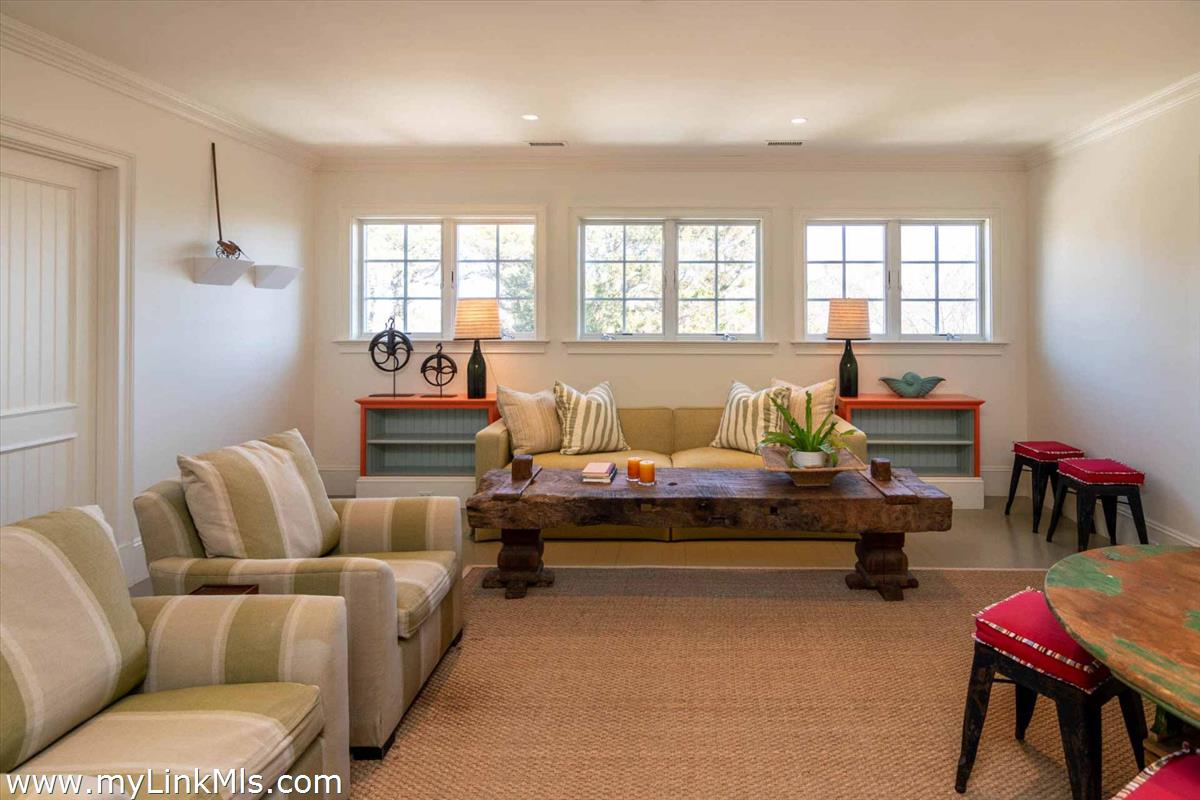 25 Lelands Path Edgartown, MA 02539 - Photo 47 of 56 a living room with furniture and a window
