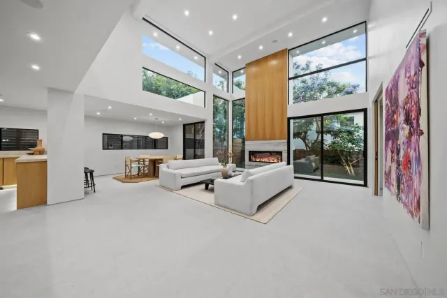 a room with furniture and a large window