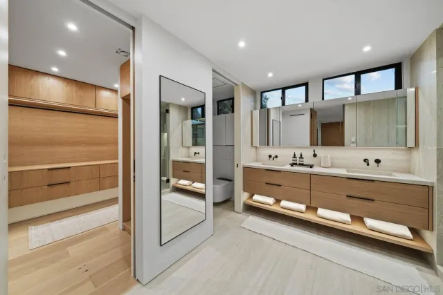 a view of balcony with wooden floor