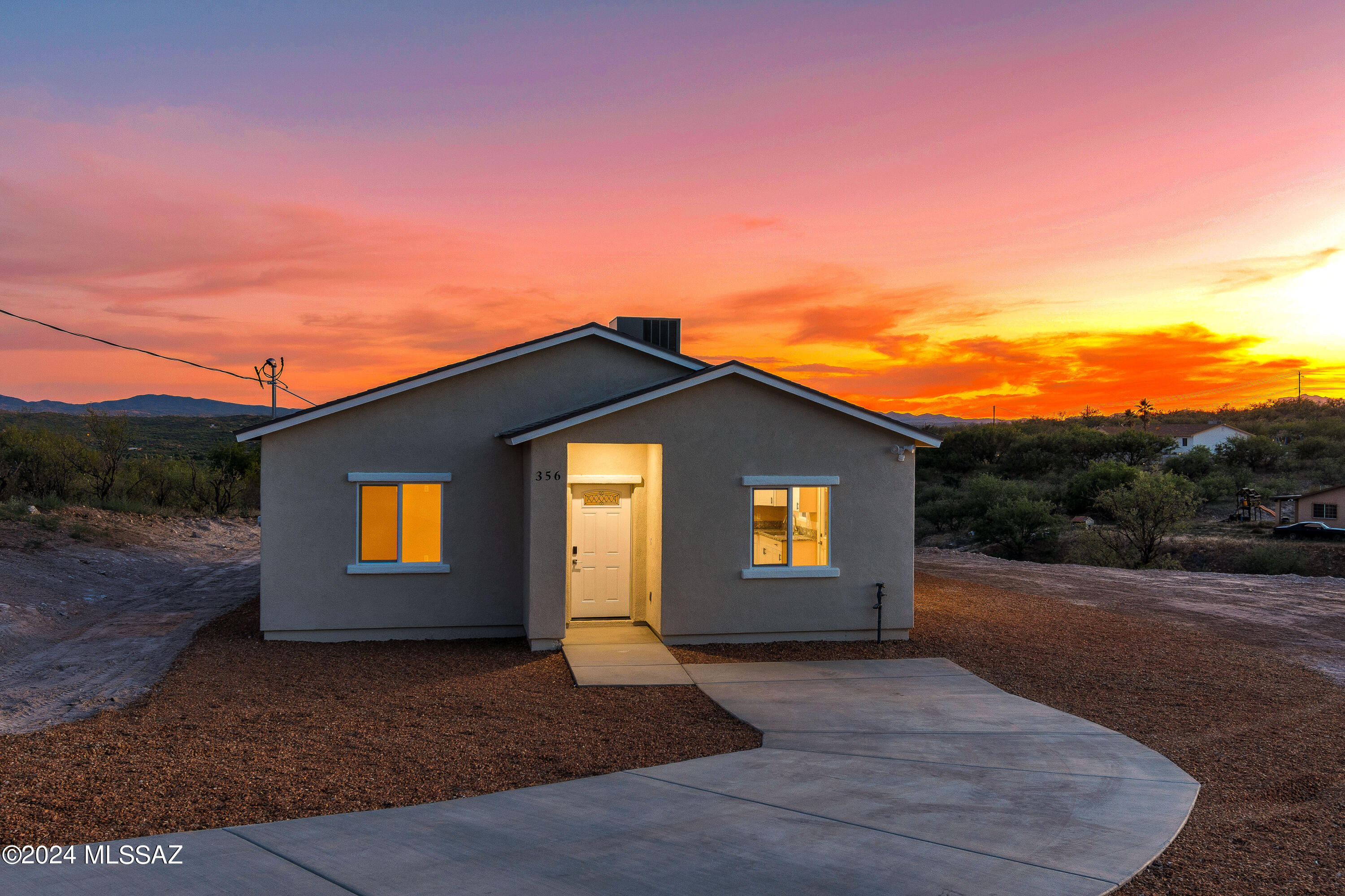 356 Globo Court Rio Rico, AZ 85648 - Photo 13 of 32 a view of a house with a yard