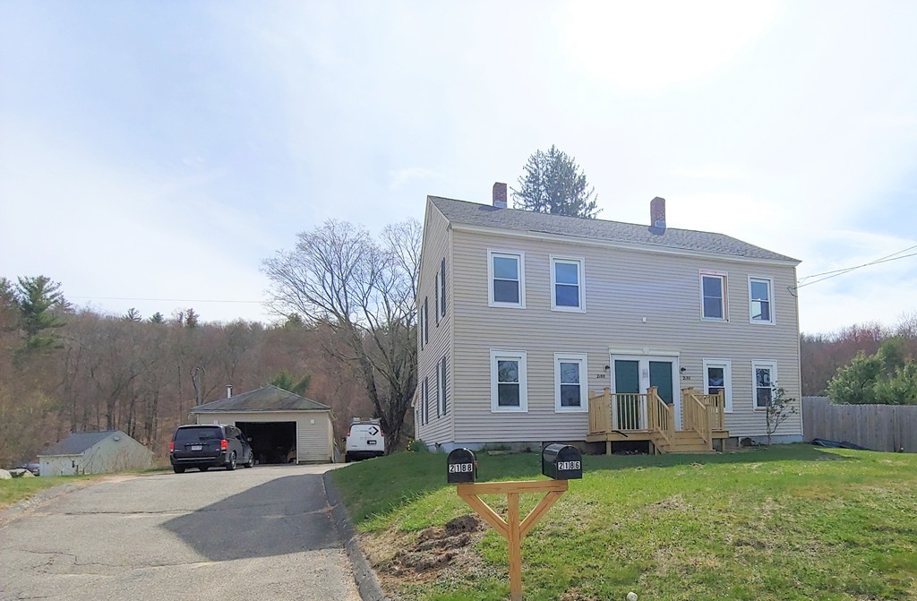 2186-2188 Palmer Road Three Rivers, MA 01080 - Photo 1 of 17 a view of a house with a patio