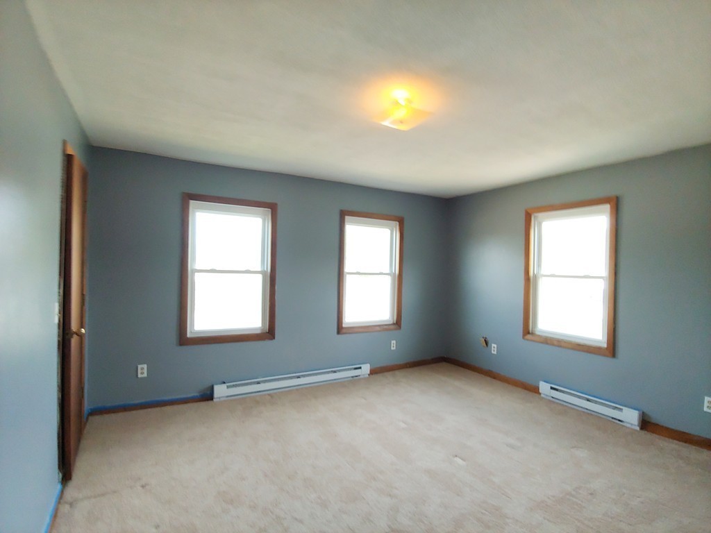 2186-2188 Palmer Road Three Rivers, MA 01080 - Photo 12 of 17 an empty room with windows