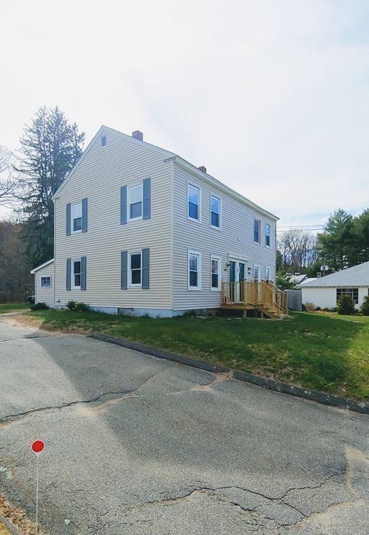 2186-2188 Palmer Road Three Rivers, MA 01080 - Photo 2 of 17 a view of a house with a back yard