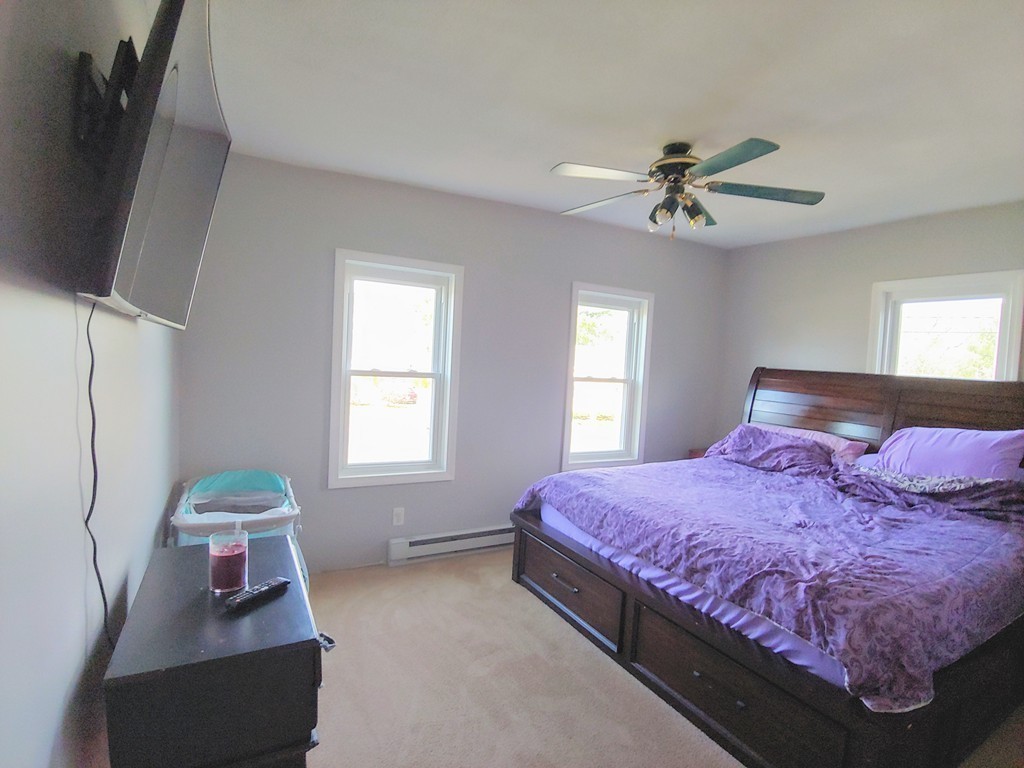 2186-2188 Palmer Road Three Rivers, MA 01080 - Photo 6 of 17 a bedroom with a bed furniture and a window