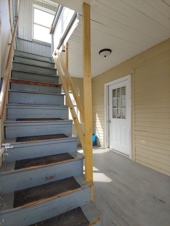 2186-2188 Palmer Road Three Rivers, MA 01080 - Photo 9 of 17 a view of entryway and hall with wooden floor