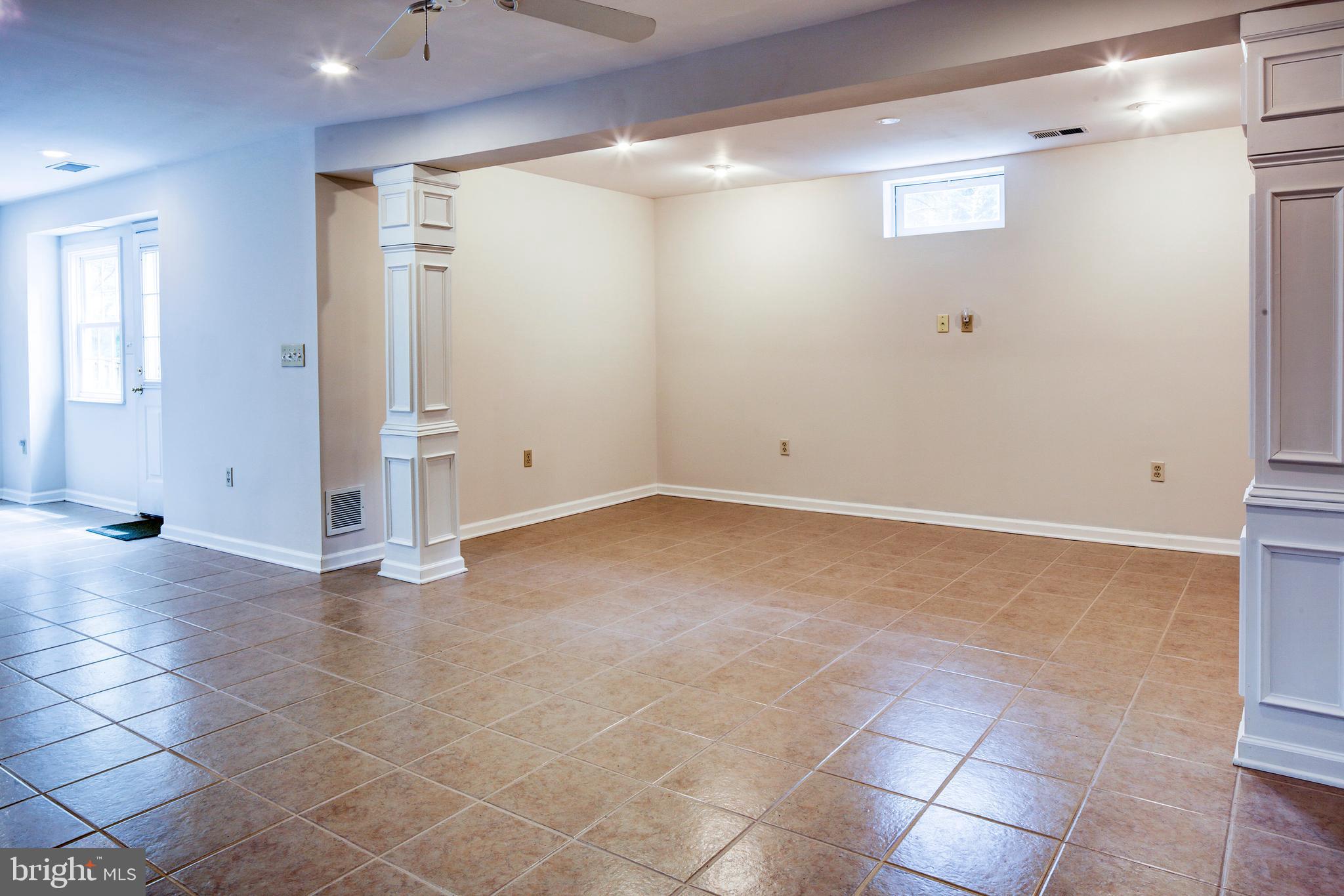 7653 Bear Forest Road Hanover, MD 21076 - Photo 25 of 36 Finished lower level. Sliders walkout to patio