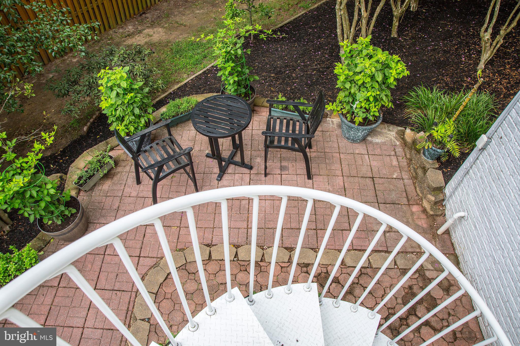 7653 Bear Forest Road Hanover, MD 21076 - Photo 32 of 36 Spiral staircase to patio