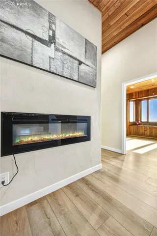 a view of a living room with a wooden floor