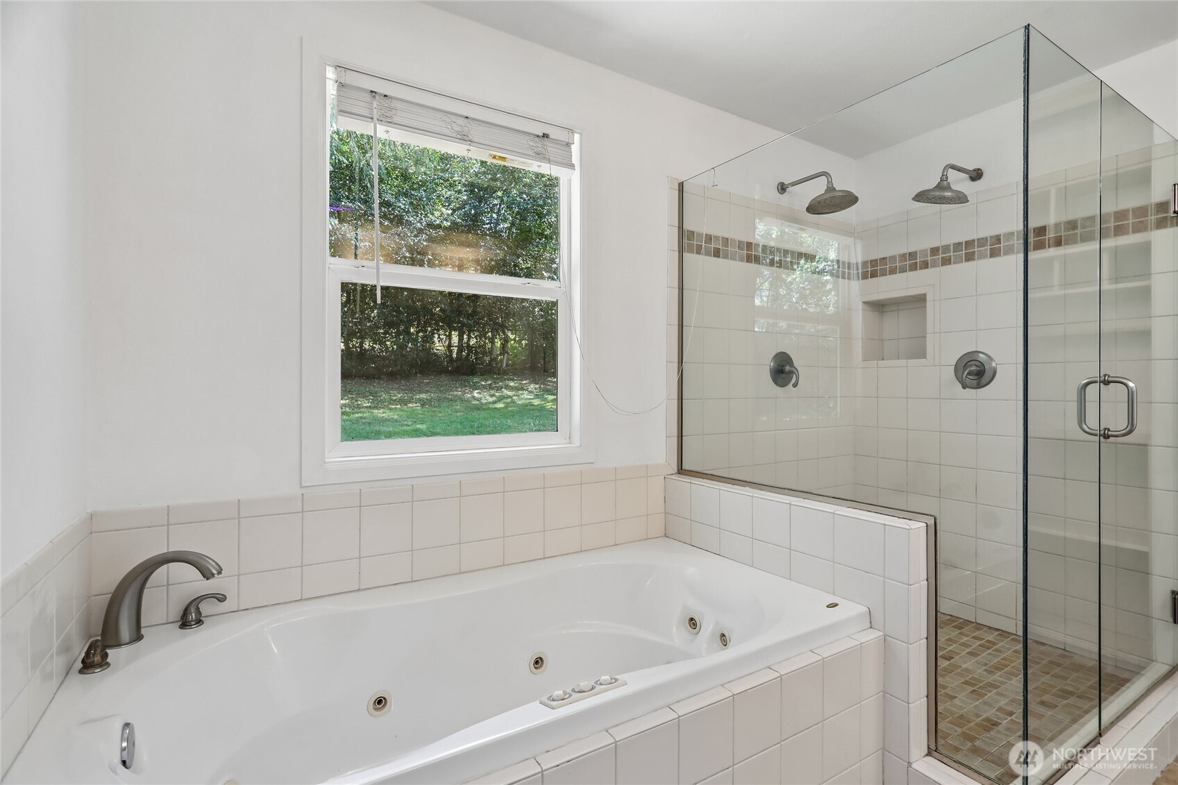 28601 Southeast 225th Street Maple Valley, WA 98038 - Photo 19 of 40 a white bath tub sitting next to a shower