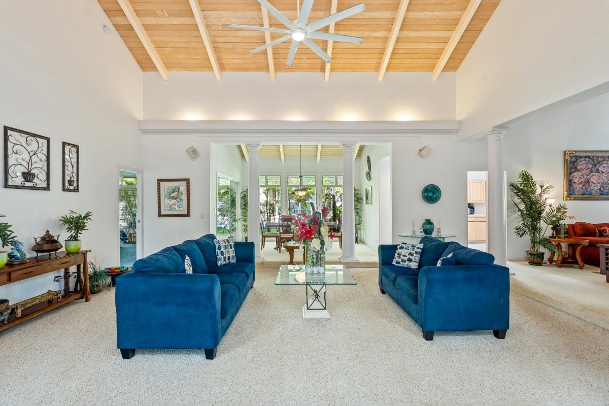 3791 Punahele Road Princeville, HI 96722 - Photo 22 of 30 a living room with furniture and a flat screen tv