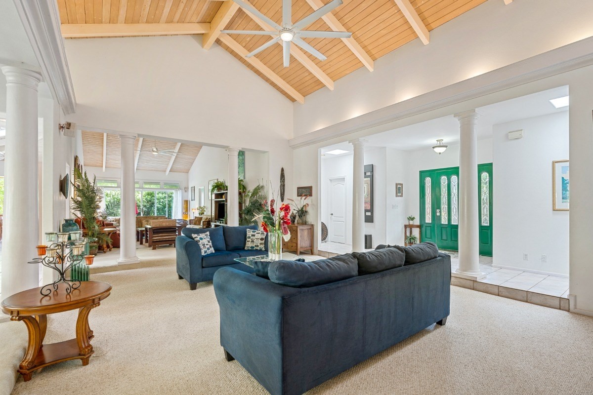3791 Punahele Road Princeville, HI 96722 - Photo 24 of 30 a living room with furniture and a large window