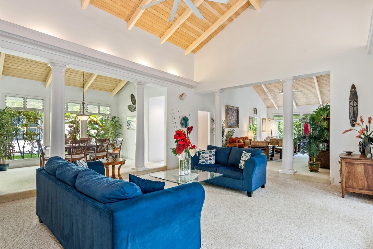 3791 Punahele Road Princeville, HI 96722 - Photo 25 of 30 a living room with furniture and a flat screen tv