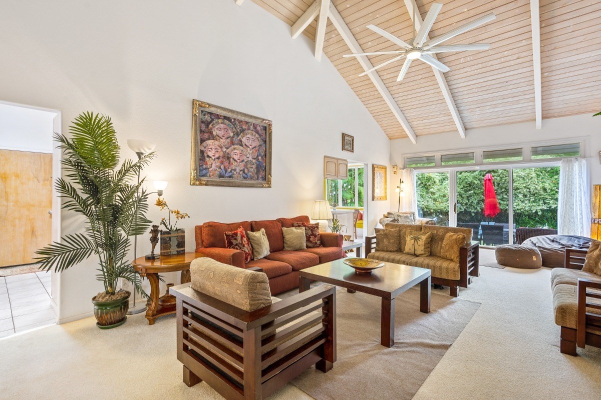 3791 Punahele Road Princeville, HI 96722 - Photo 29 of 30 a living room with furniture and a large window