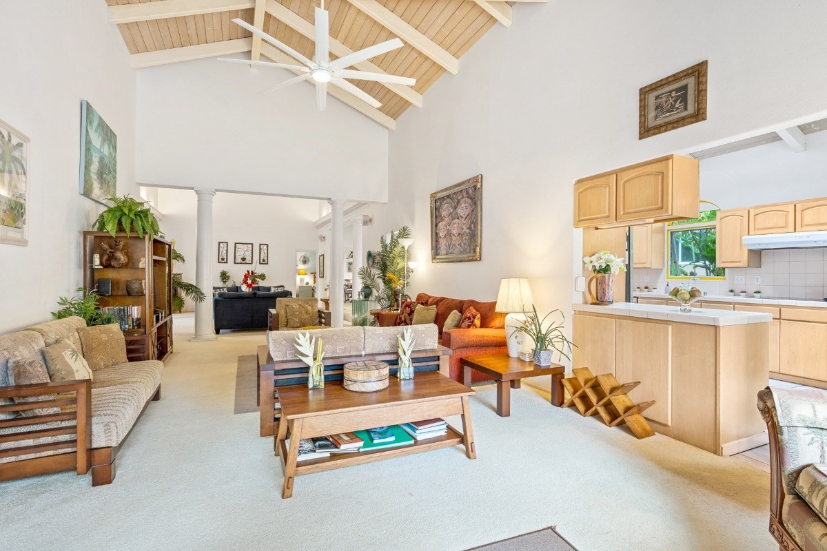 3791 Punahele Road Princeville, HI 96722 - Photo 8 of 30 a living room with patio furniture and a chandelier