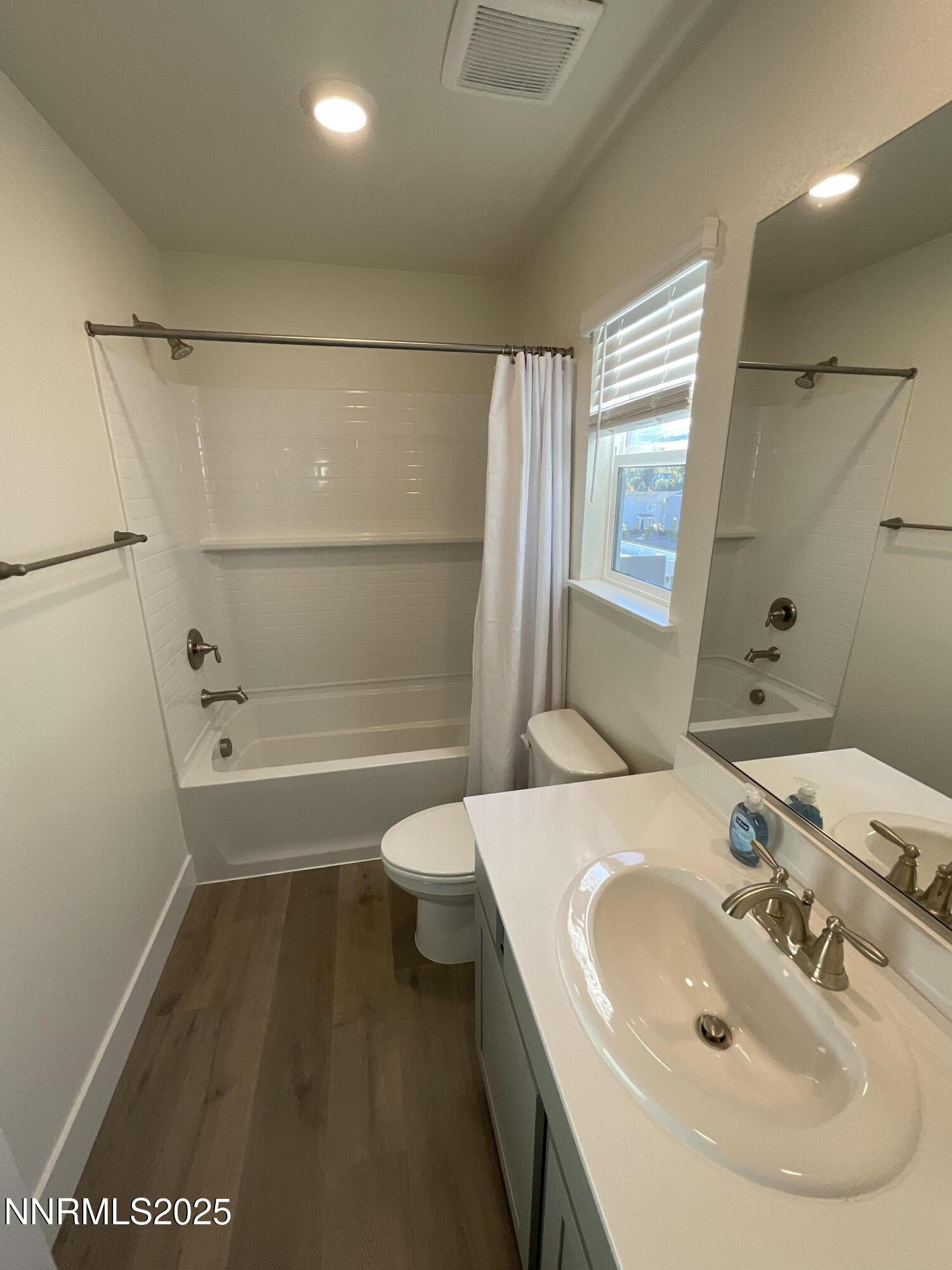 4128 Scenic Drive Reno, NV 89523 - Photo 13 of 20 a bathroom with a sink a toilet and shower