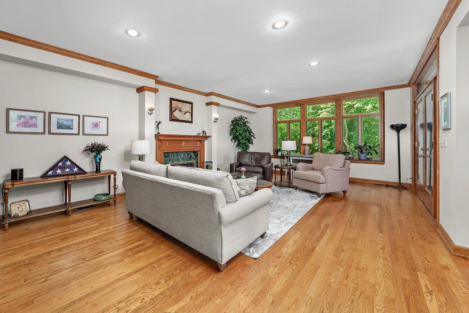 720 Rosedale Terrace Crete, IL 60417 - Photo 6 of 29 a living room with furniture and a wooden floor