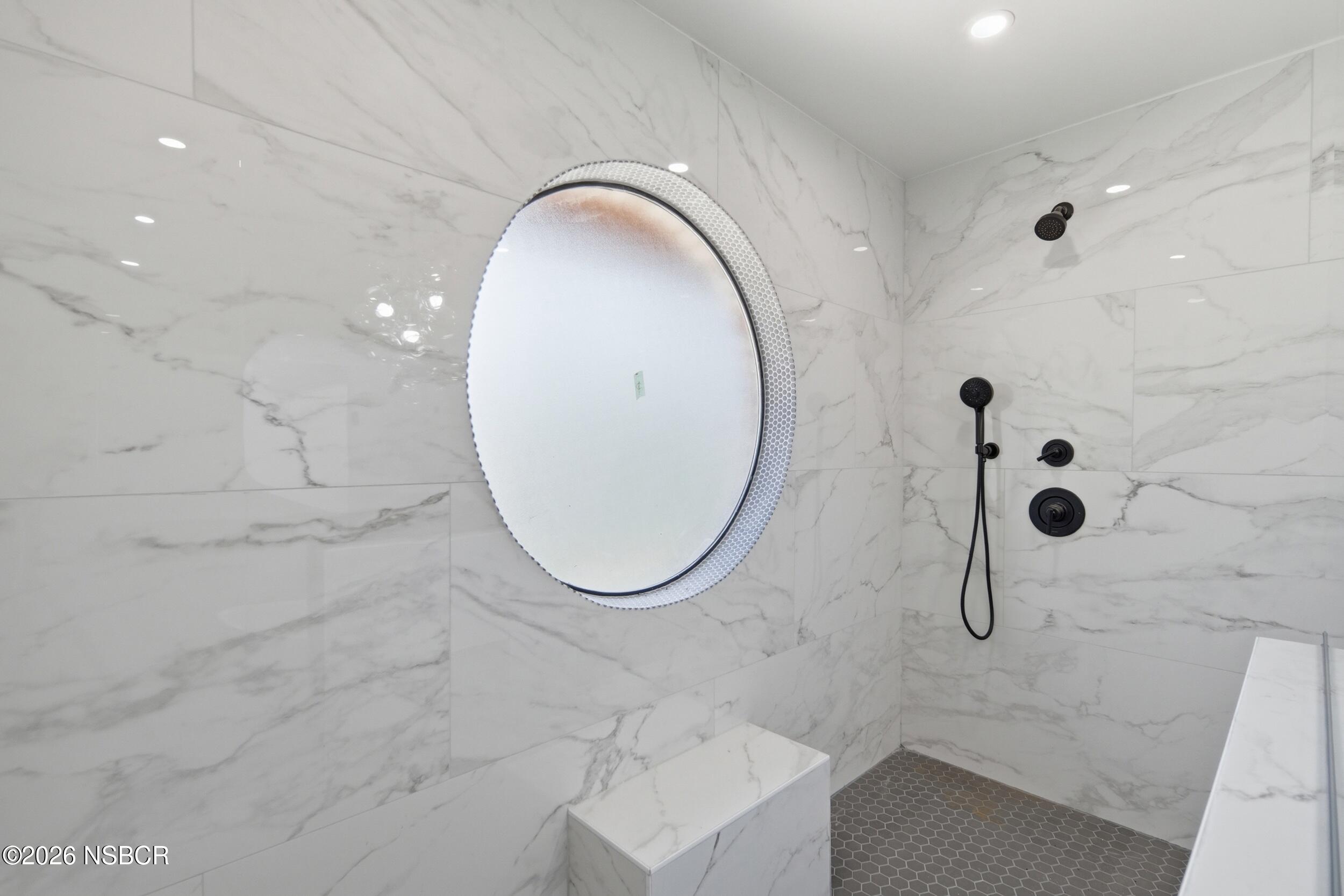 140 East Rice Ranch Road Santa Maria, CA 93455 - Photo 30 of 44 a bathroom with a sink a mirror and shower