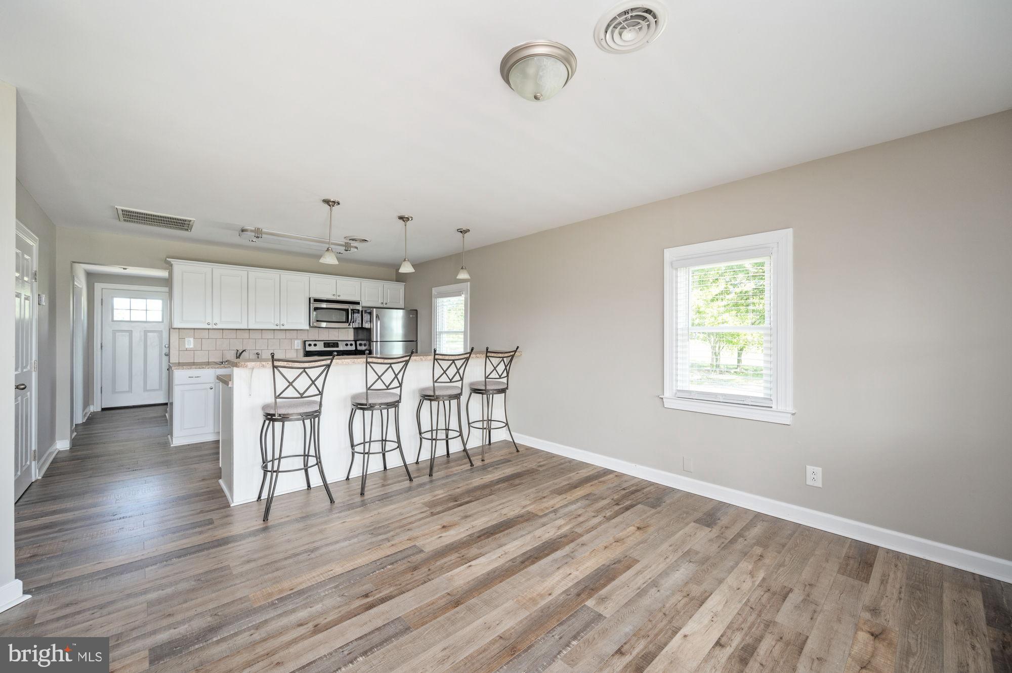 161 Forest Lane Road Fredericksburg, VA 22405 - Photo 22 of 99 Living room open to kitchen