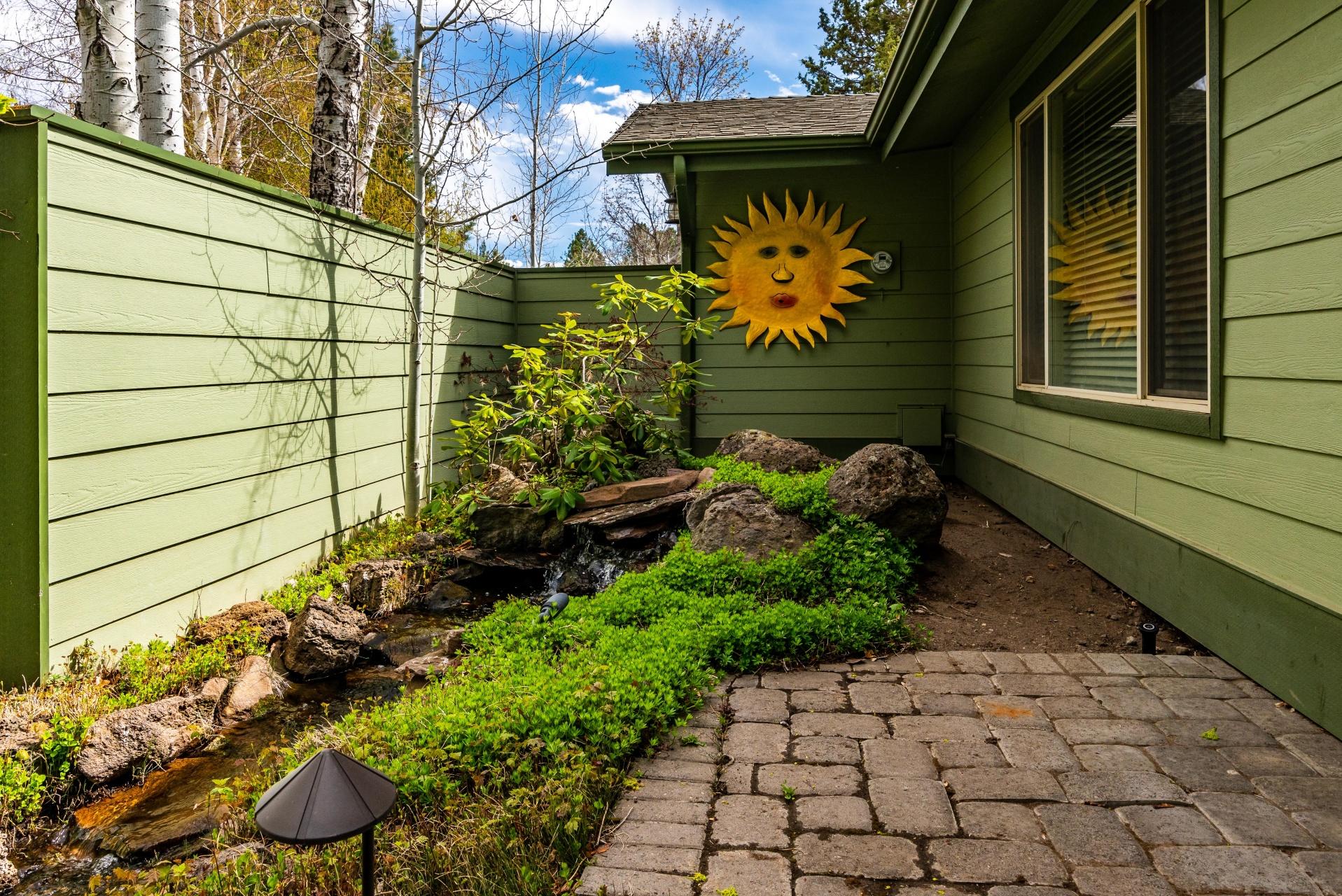 61919 Dobbin Road Bend, OR 97702 - Photo 44 of 57 a couple of flower plants in front of door