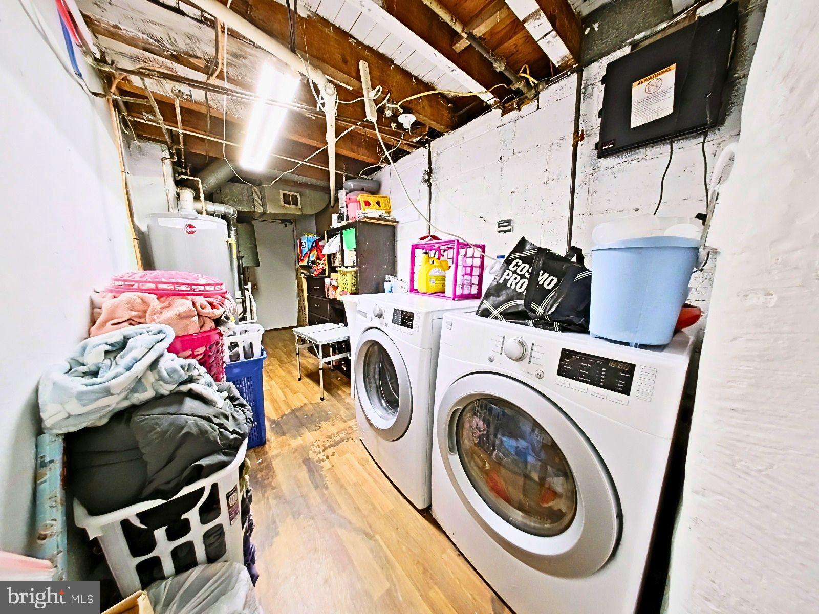 5844 Saul Street Philadelphia, PA 19149 - Photo 30 of 36 a utility room with dryer and washer