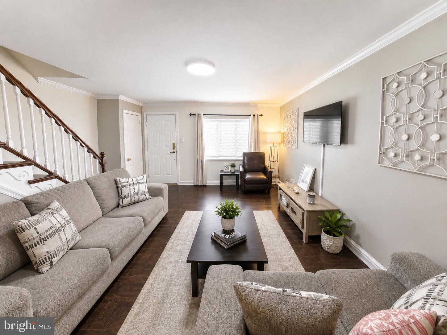 5844 Saul Street Philadelphia, PA 19149 - Photo 3 of 36 a living room with furniture or couch and a potted plant