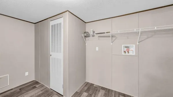 a view of a hallway with closet