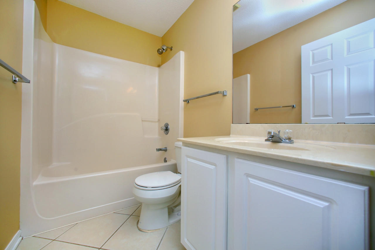 27 Inlet Drive Miramar Beach, FL 32550 - Photo 16 of 23 a bathroom with a granite countertop sink toilet and shower