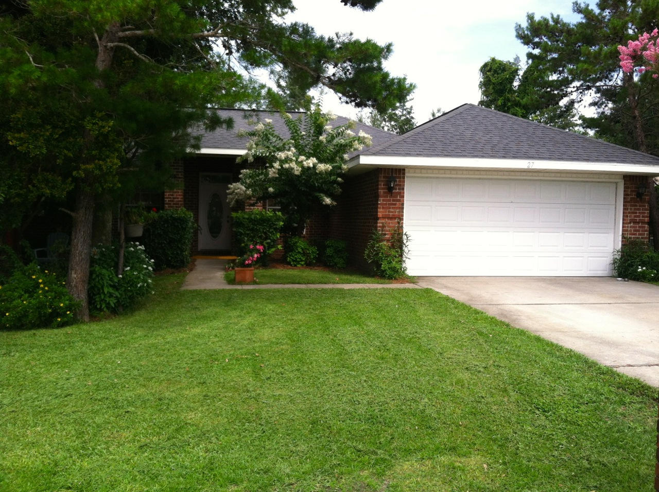 27 Inlet Drive Miramar Beach, FL 32550 - Photo 2 of 23 a view of a yard in front of house
