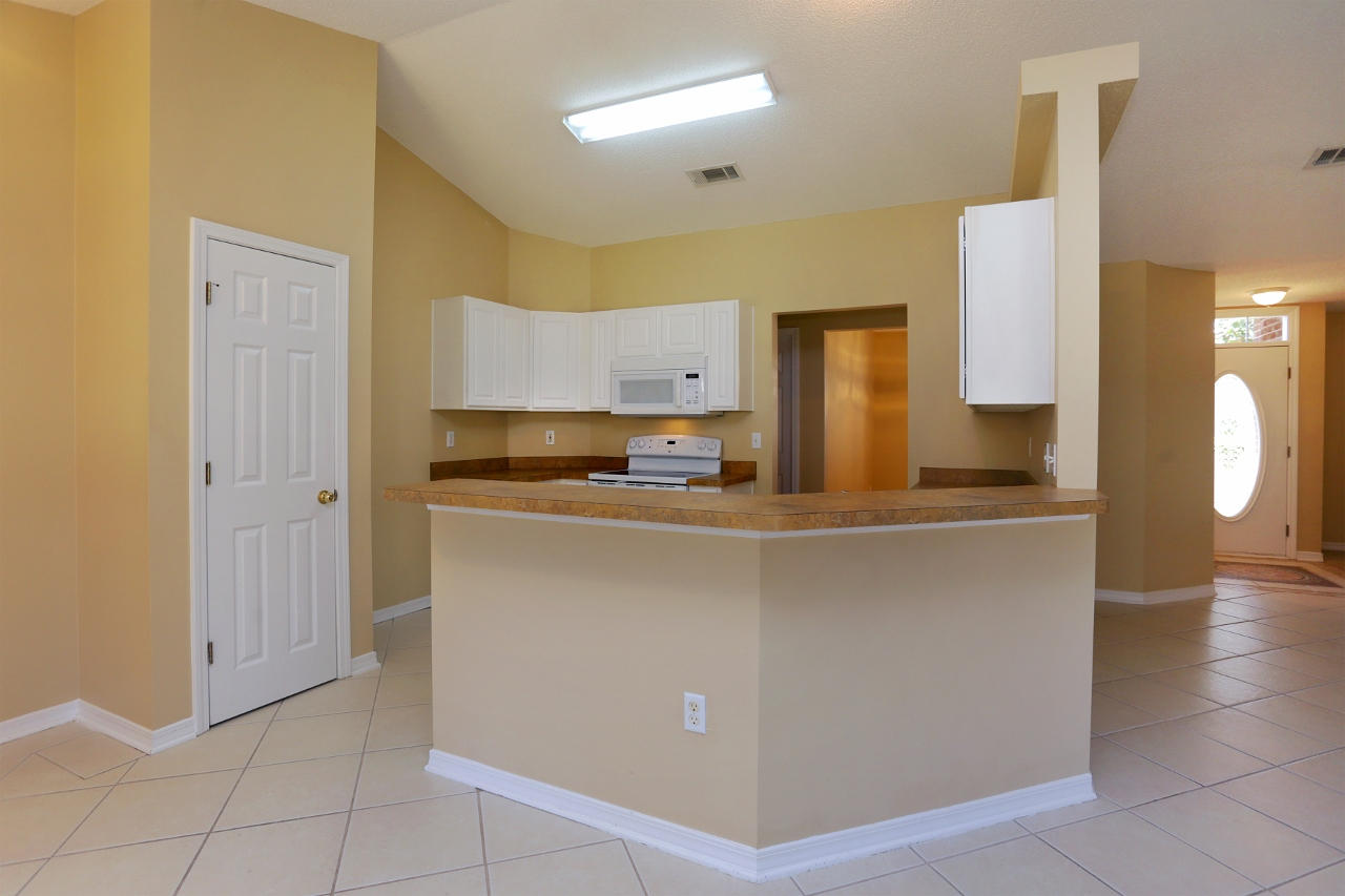 27 Inlet Drive Miramar Beach, FL 32550 - Photo 8 of 23 a kitchen with stainless steel appliances granite countertop a refrigerator and a stove