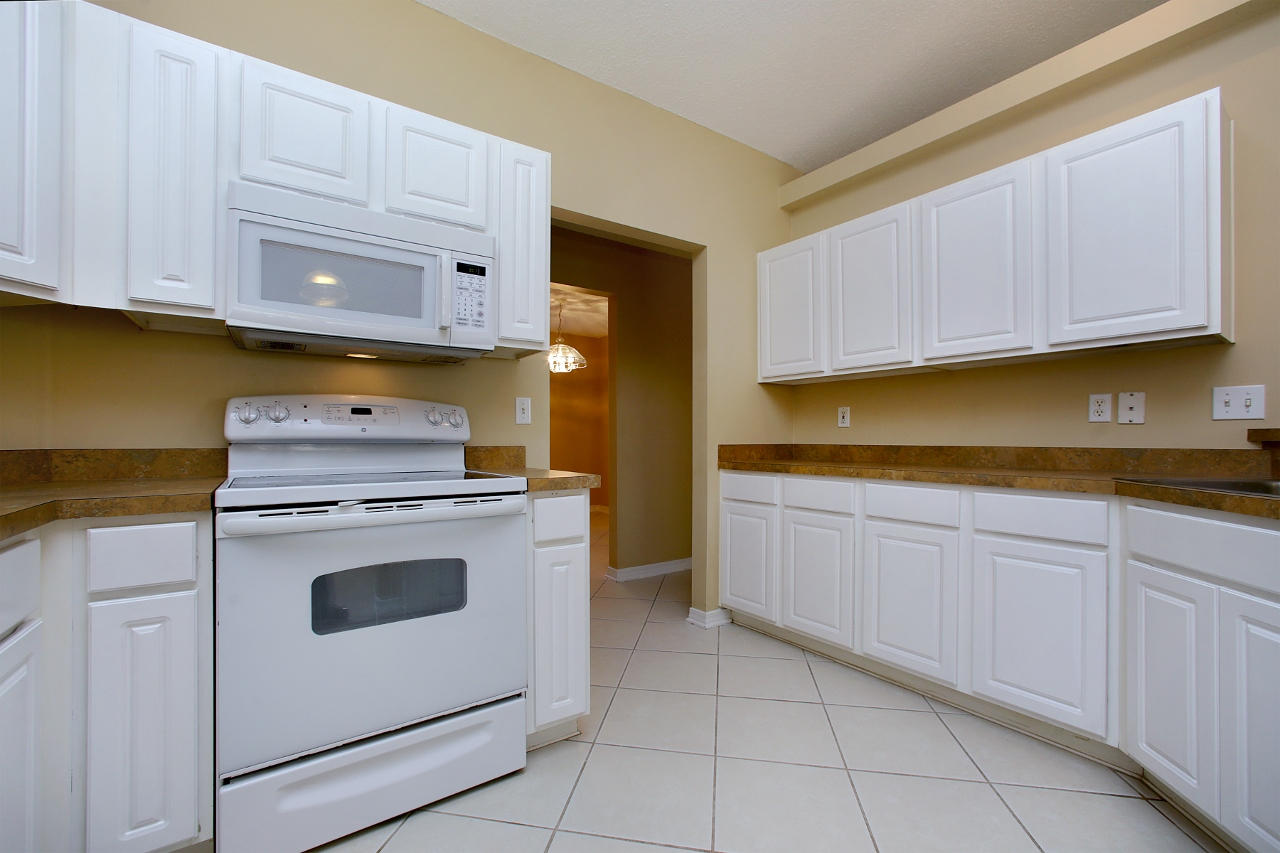 27 Inlet Drive Miramar Beach, FL 32550 - Photo 9 of 23 a kitchen with cabinets appliances and a sink